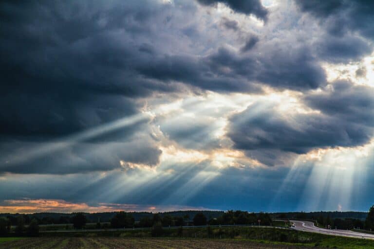 An image of clouds with light shining through them